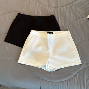 Two pairs of Express Shorts. Black and white. size 6.